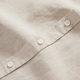 material shot of the buttons on The Short Sleeve California in Sage Hemp