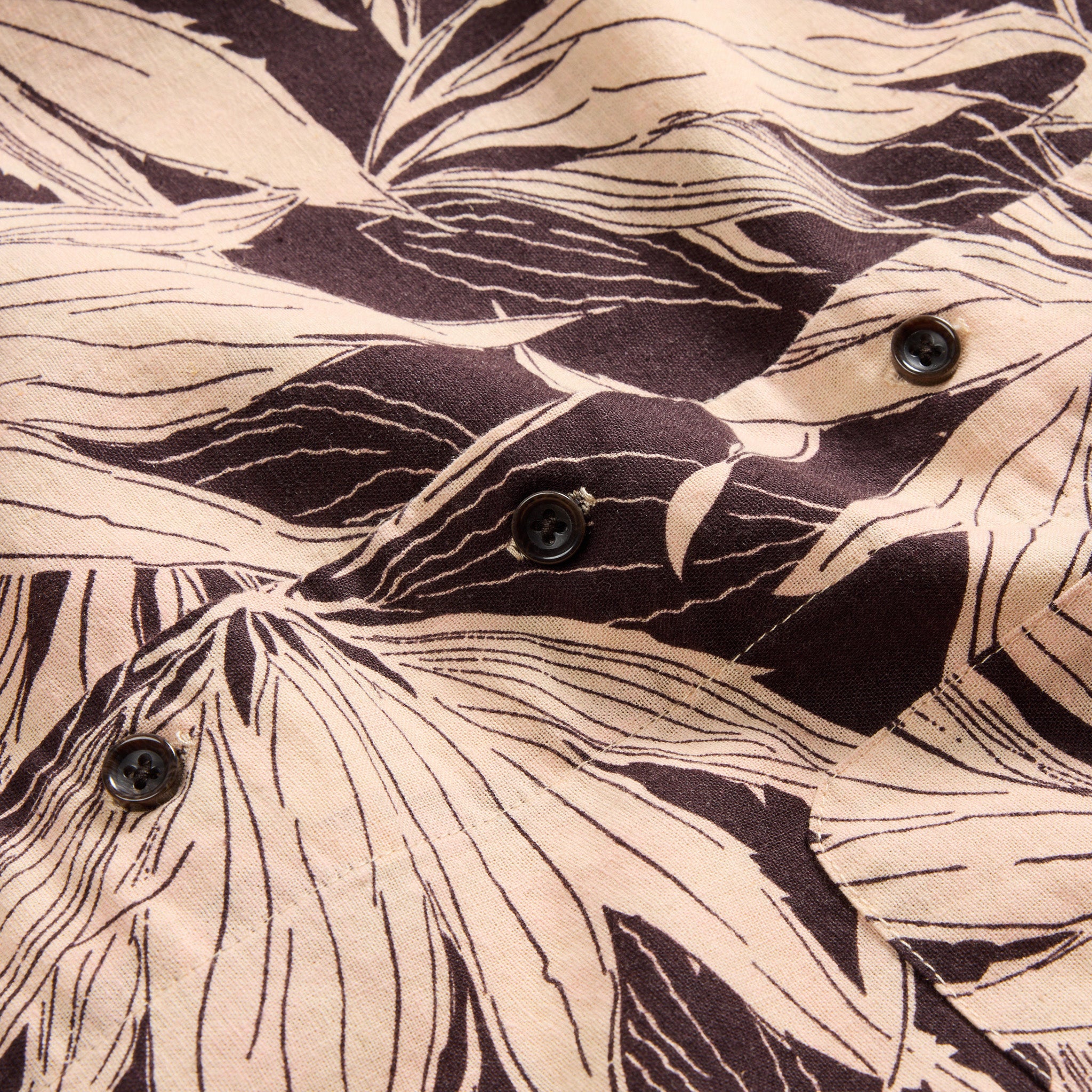 material shot of the horn buttons on The Short Sleeve Hawthorne in Dried Palm, Wovens by Taylor Stitch