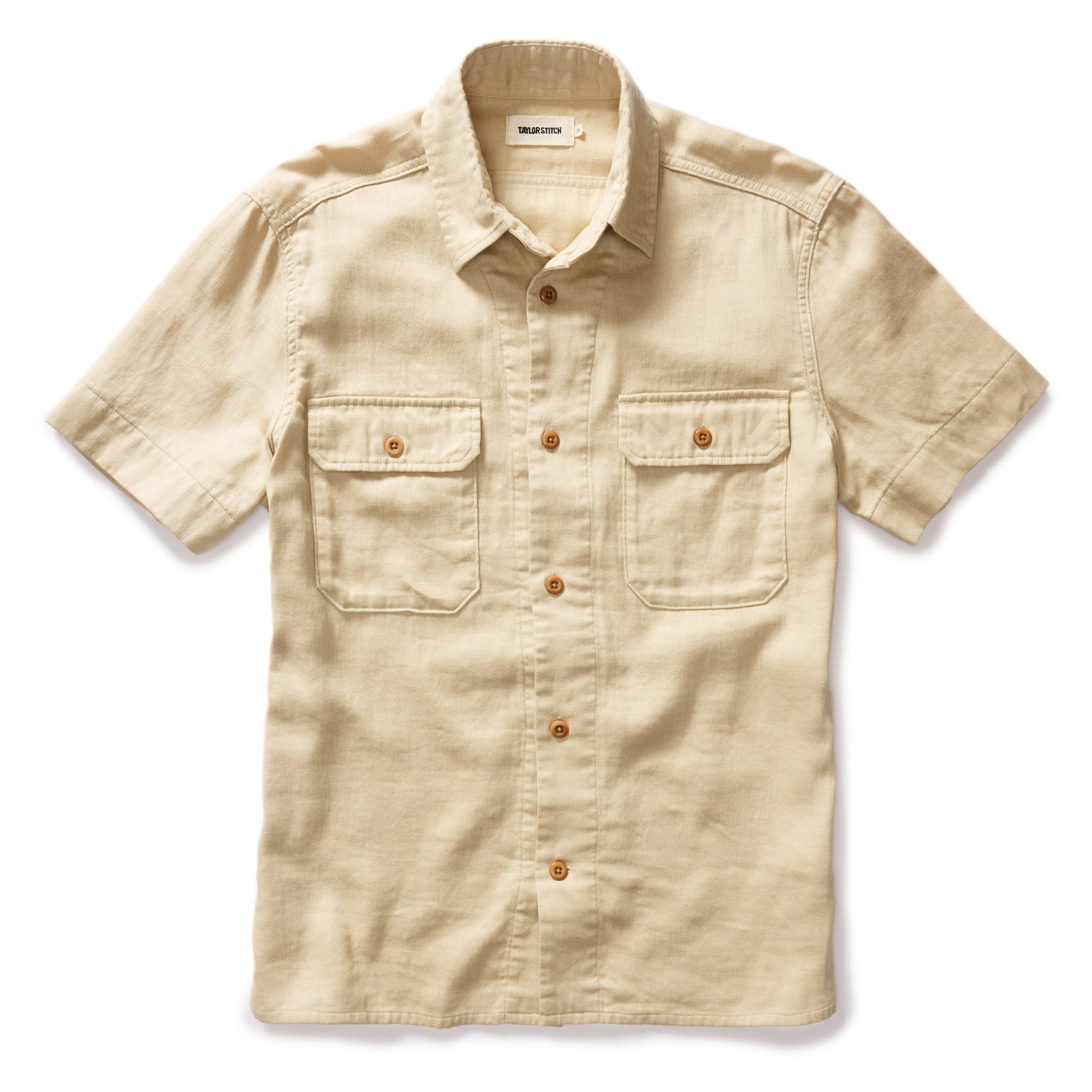 flatlay of The Short Sleeve Officer Shirt in Dune Double Cloth, Wovens by Taylor Stitch