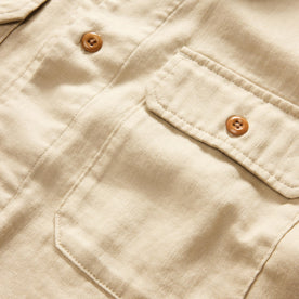 material shot of the buttons and pocket on The Short Sleeve Officer Shirt in Dune Double Cloth