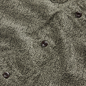 material shot of the buttons on The Short Sleeve Officer Shirt in Static Camo Double Cloth