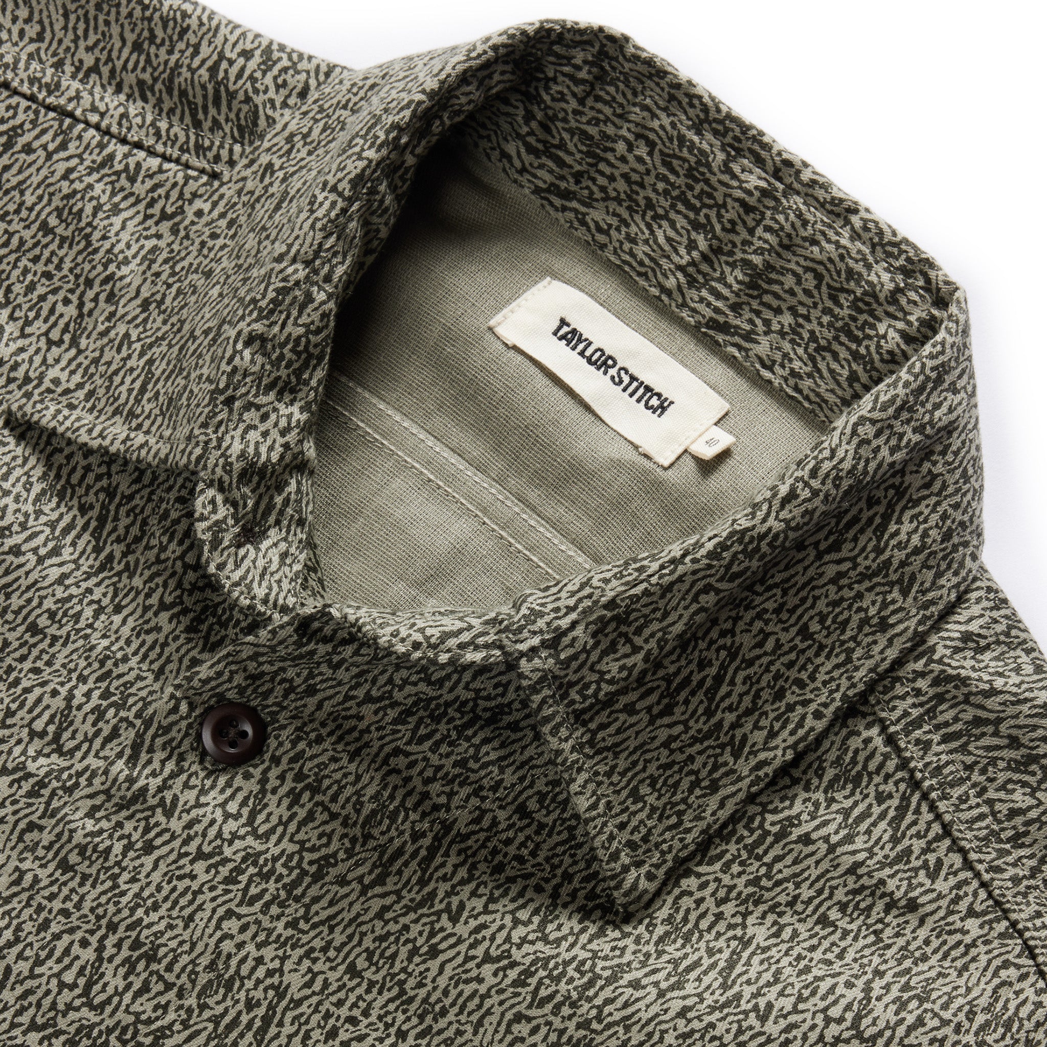 material shot of the collar on The Short Sleeve Officer Shirt in Static Camo Double Cloth, Wovens by Taylor Stitch
