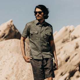 fit model posing in The Short Sleeve Officer Shirt in Static Camo Double Cloth