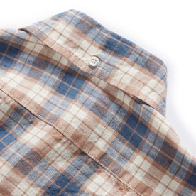 material shot of the button down collar on the back of The Jack in Sunrise Plaid Linen