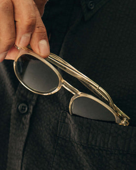 fit model putting The Legend in Crystal into a pocket, Accessories by Taylor Stitch
