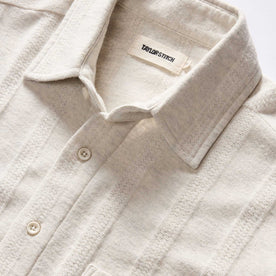 material shot of the collar on The Short Sleeve California in Heather Ash Pointelle Stripe