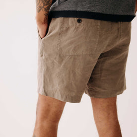 fit model showing off the back pockets on The Apres Short in Canteen Hemp