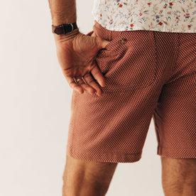 fit model showing off the back pocket of The Apres Short in Fired Brick Dobby