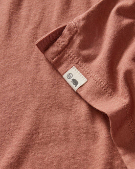 material shot of the logo on The Cotton Hemp Polo in Fired Clay, Knits by Taylor Stitch