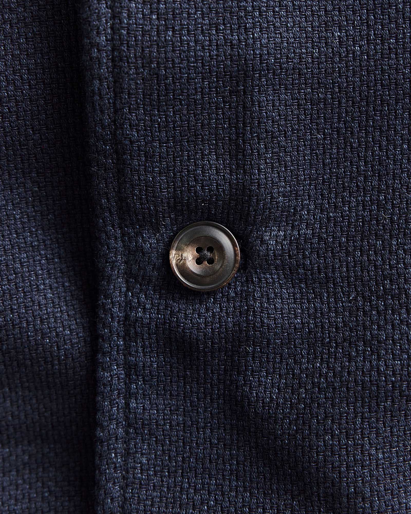 material shot of the buttons on The Crew Jacket in Raw Indigo Sashiko, Outerwear by Taylor Stitch