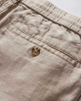 material shot of the back pocket on The Easy Short in Natural Linen, Bottoms by Taylor Stitch