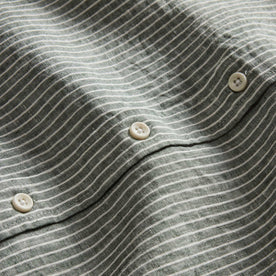 material shot of the buttons on The Jack in Cilantro Stripe Linen