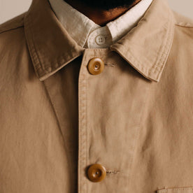 fit model showing off the buttons on The Ojai Jacket in Organic Light Khaki Foundation Twill