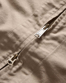 material shot of the two way zipper on The Shifter Jacket in Baked Soil Canvas, Outerwear by Taylor Stitch