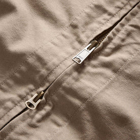 material shot of the two way zipper on The Shifter Jacket in Baked Soil Canvas