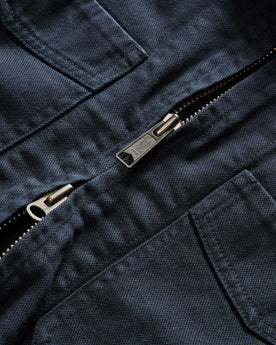 material shot of the two-way zipper on The Station Jacket in Dark Navy Broken Twill, Outerwear by Taylor Stitch