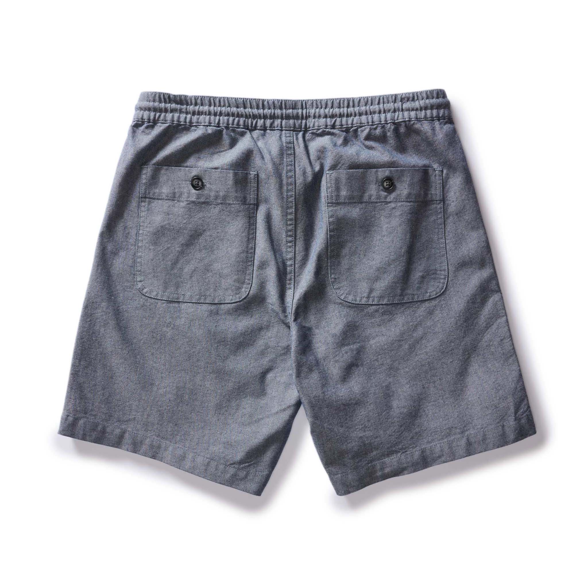 flatlay of the back of The Apres Short in Indigo Chambray, Bottoms by Taylor Stitch