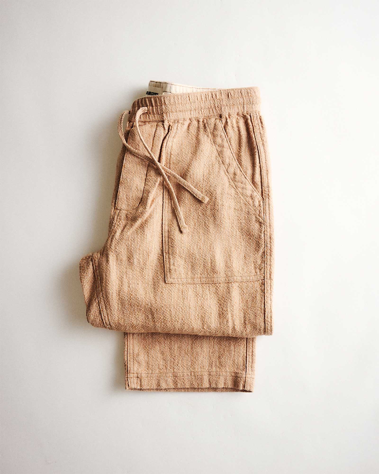 material shot of the waistband on The Breakwater Pant in Chili Stripe, Bottoms by Taylor Stitch