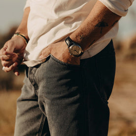 fit model with his hand in the pocket of The Camp Pant in Coal Chipped Canvas