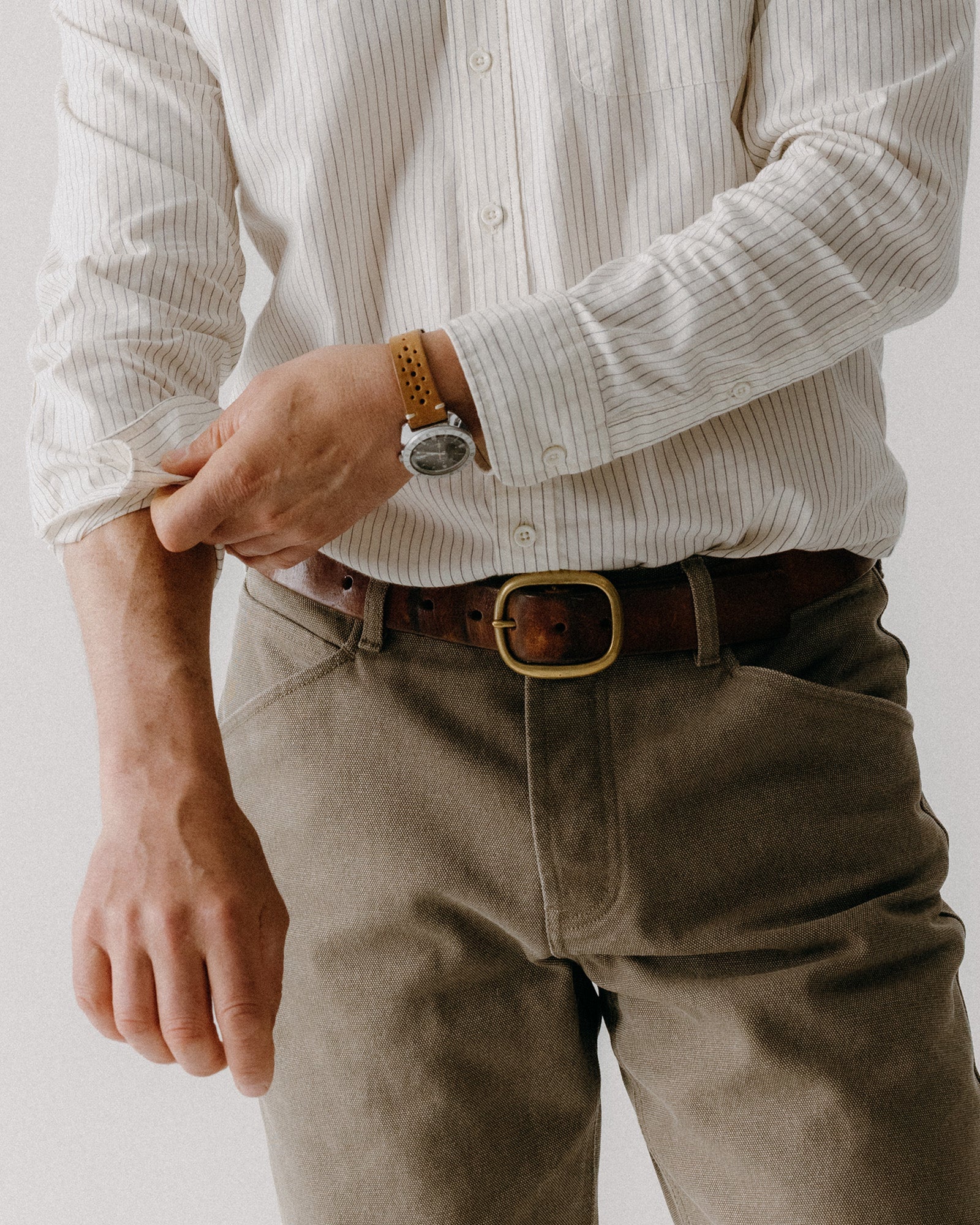 fit model standing in The Camp Pant in Stone Chipped Canvas, Bottoms by Taylor Stitch