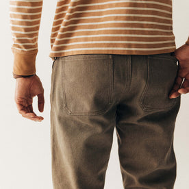 fit model showing off the back of The Camp Pant in Stone Chipped Canvas