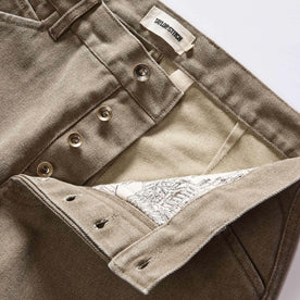 material shot of the button fly on The Camp Pant in Stone Chipped Canvas