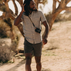 fit model walking wearing The Camp Short in Coal Chipped Canvas