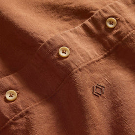 material shot of the buttons on The Conrad Shirt in Adobe Embroidery