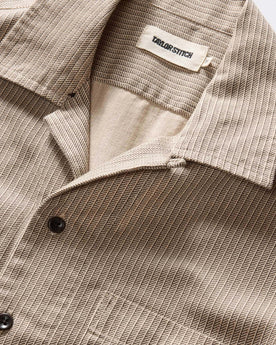material shot of the collar on The Conrad Shirt in Black Coffee Stripe, Wovens by Taylor Stitch