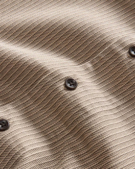 material shot of the buttons on The Conrad Shirt in Black Coffee Stripe, Wovens by Taylor Stitch