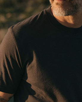 fit model showing off the sleeves on The Cotton Hemp Tee in Charcoal, Knits by Taylor Stitch