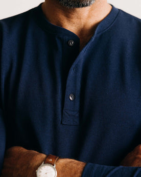 fit model showing off the buttons on The Heavy Bag Henley in Navy, Knits by Taylor Stitch