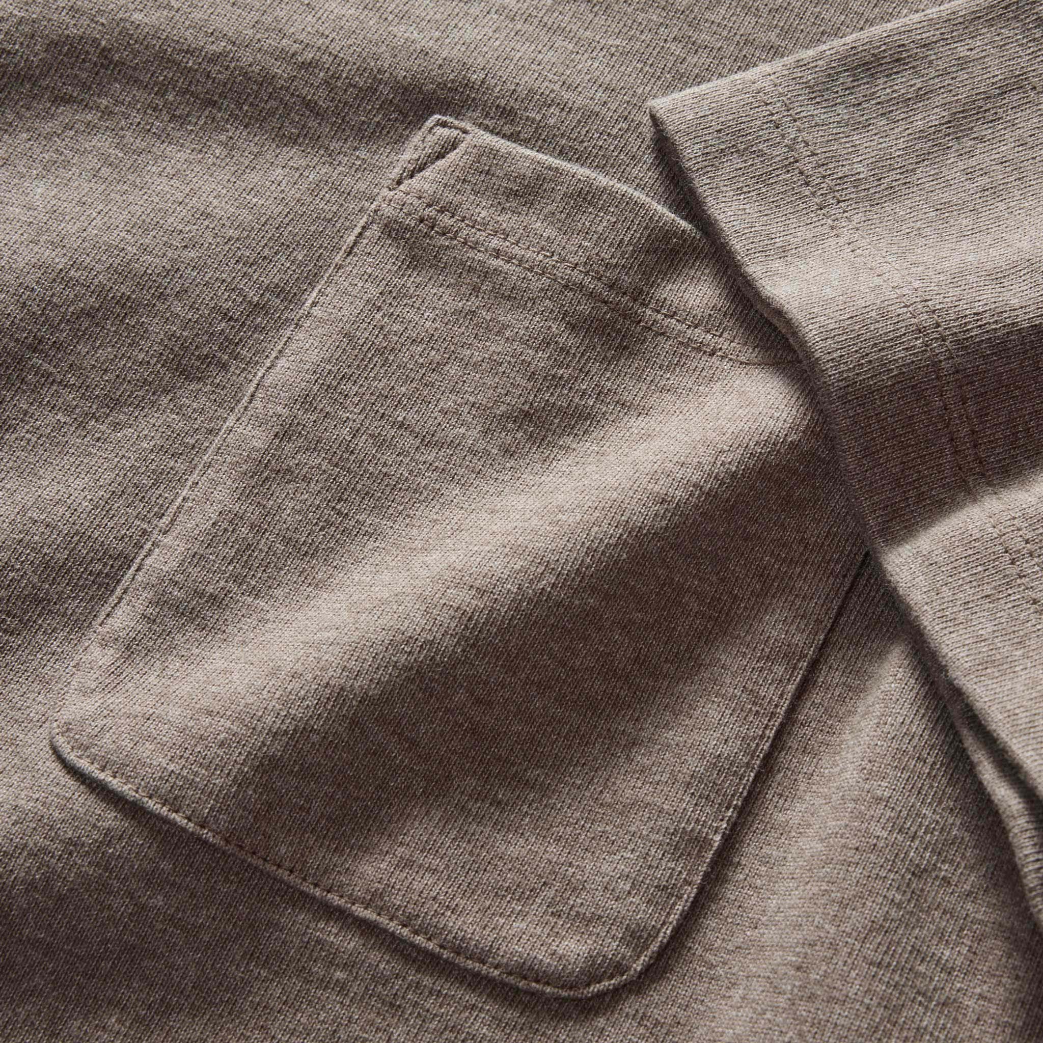 material shot of the pocket on The Heavy Bag Tee In Smoked Olive, Knits by Taylor Stitch