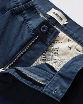 material shot of the zipper on The Matlow Short in Dark Navy Herringbone, Bottoms by Taylor Stitch