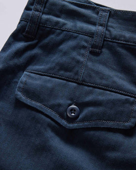 material shot of the back pocket on The Matlow Short in Dark Navy Herringbone, Bottoms by Taylor Stitch