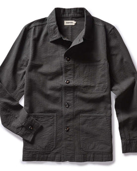 The Ojai Chore Coat in Faded Black Seersucker flatlay, Outerwear by Taylor Stitch