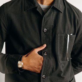 fit model showing off the buttons on The Ojai Jacket in Faded Black Seersucker