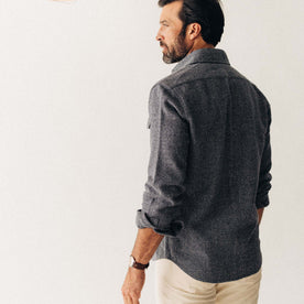 fit model showing off the back of The Point Shirt in Heather Blue Linen Tweed