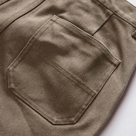 material shot of the back pockets on The Camp Short in Stone Chipped Canvas