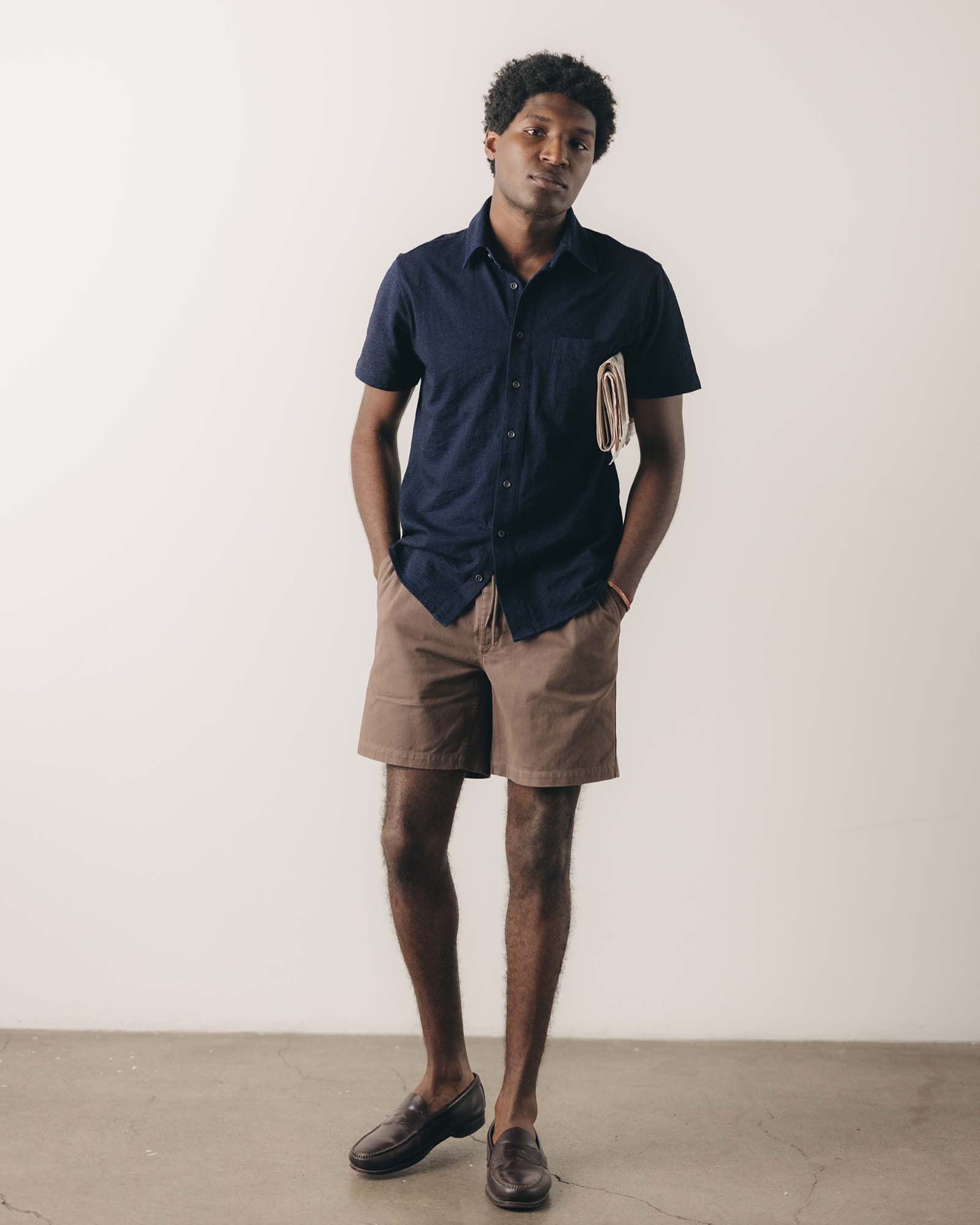 fit model showing off the collar on The Short Sleeve California in Rinsed Indigo Slub, Knits by Taylor Stitch