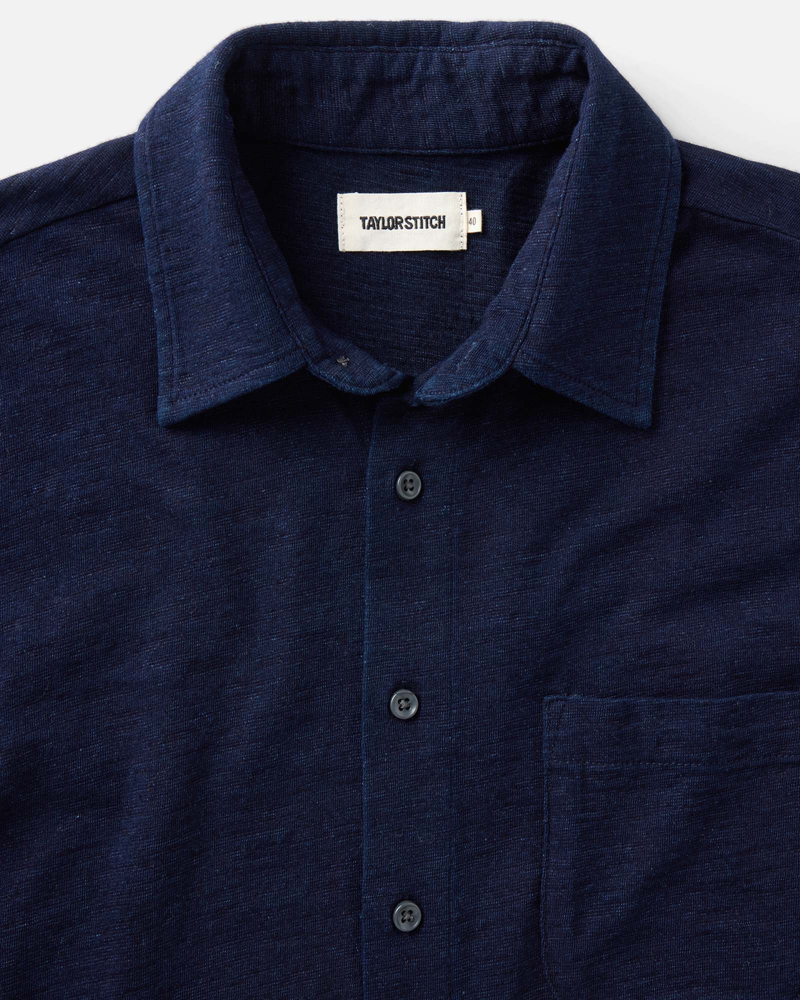 material shot of the collar on The Short Sleeve California in Rinsed Indigo Slub, Knits by Taylor Stitch