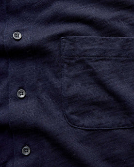 material shot of the pocket on The Short Sleeve California in Rinsed Indigo Slub, Knits by Taylor Stitch