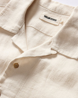 material shot of the collar on The Short Sleeve Davis Shirt in Natural Palm Embroidery, Wovens by Taylor Stitch