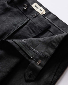 material shot of the zipper fly on The Thomas Trouser in Coal Linen Twill, Bottoms by Taylor Stitch
