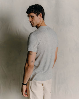 fit model showing off the back of The Cotton Hemp Tee in Heather Grey, Knits by Taylor Stitch