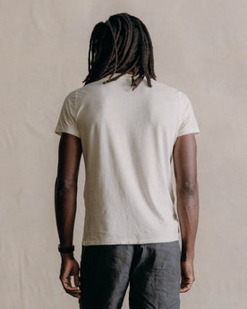 fit model showing off the back of The Cotton Hemp Tee in Natural, Knits by Taylor Stitch