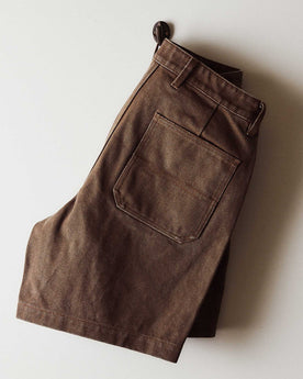 editorial image of The Camp Short in Aged Penny Chipped Canvas hanging, Bottoms by Taylor Stitch