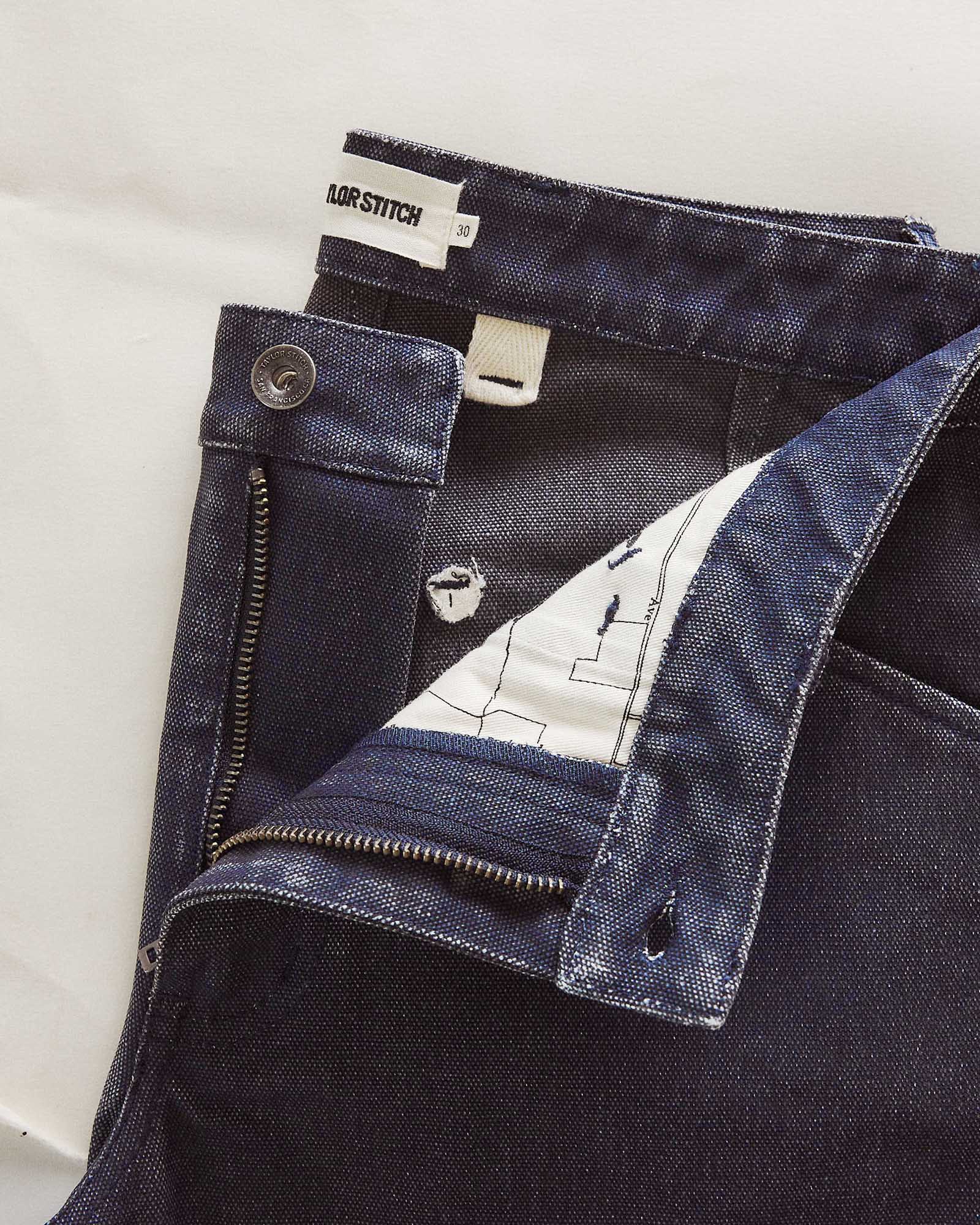 material shot of the zipper on The Camp Short in Navy Chipped Canvas, Bottoms by Taylor Stitch