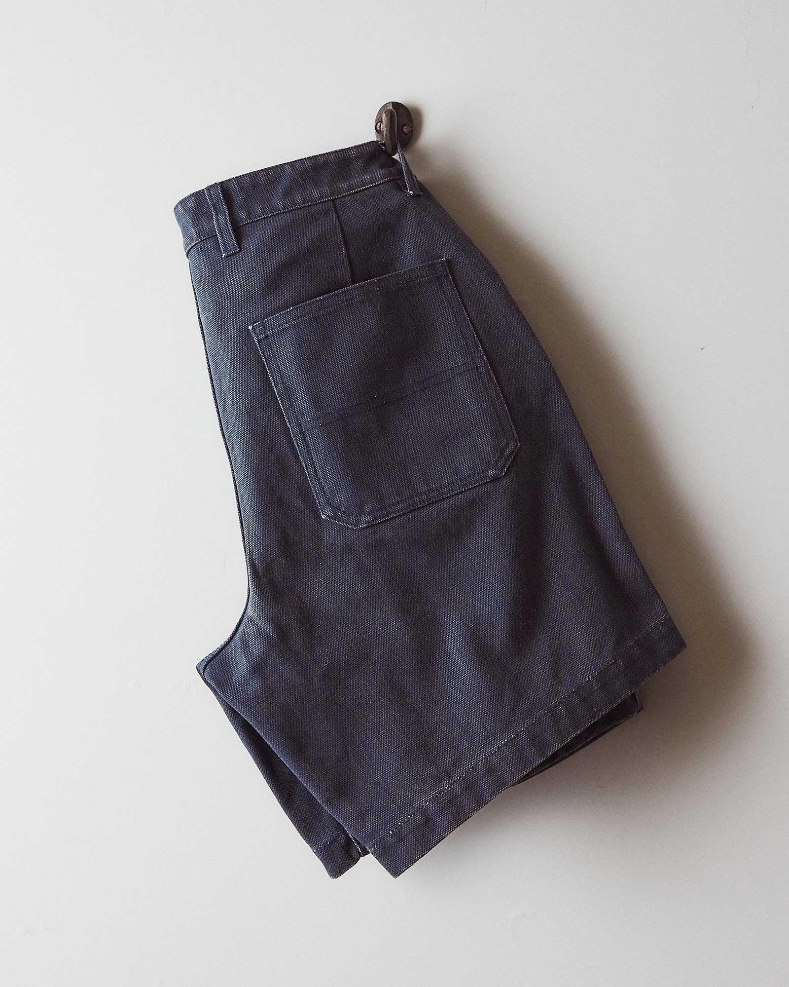 editorial flatlay of the back of The Camp Short in Navy Chipped Canvas, Bottoms by Taylor Stitch