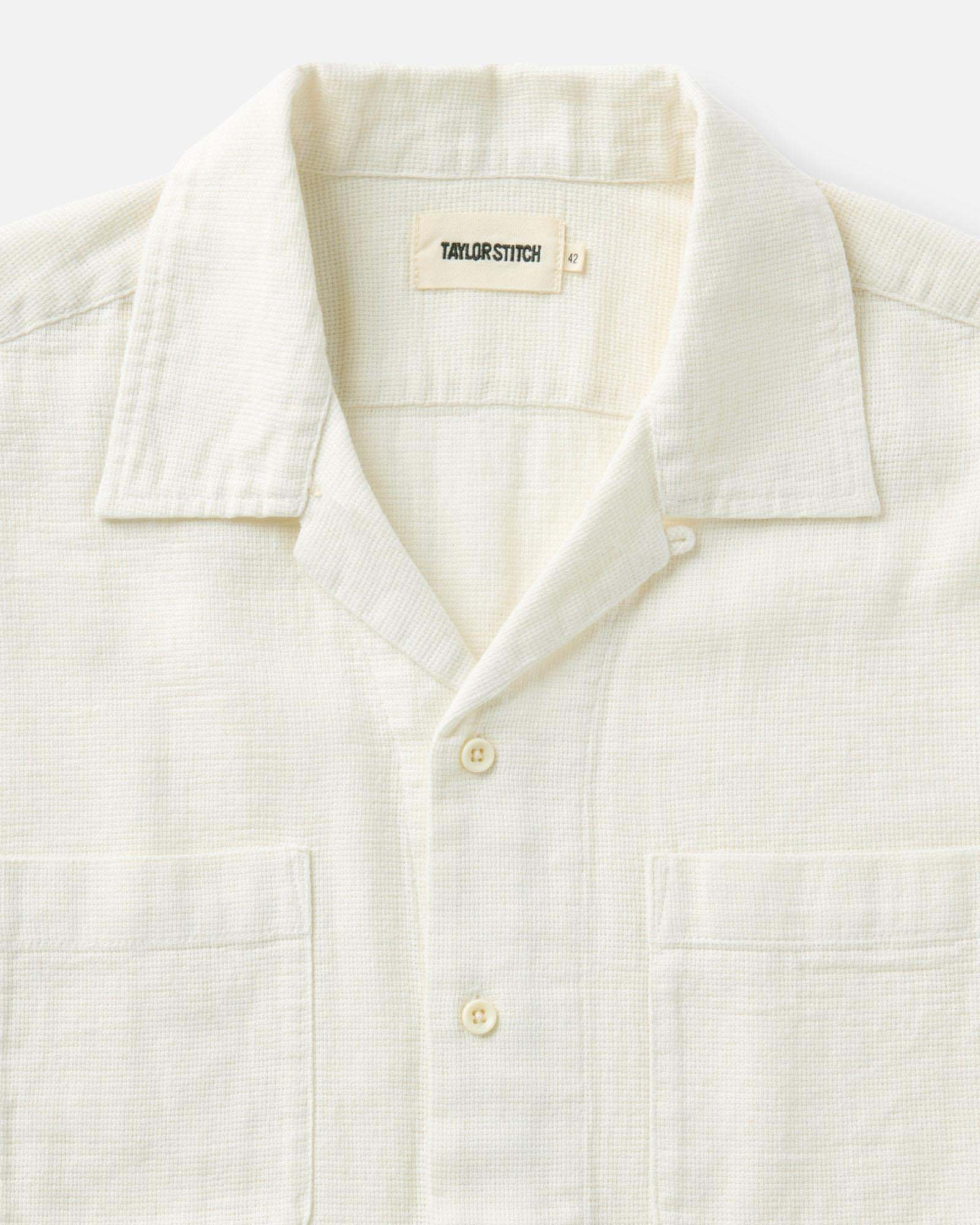 fit model sitting wearing The Conrad Shirt in Vintage White Linen, Wovens by Taylor Stitch